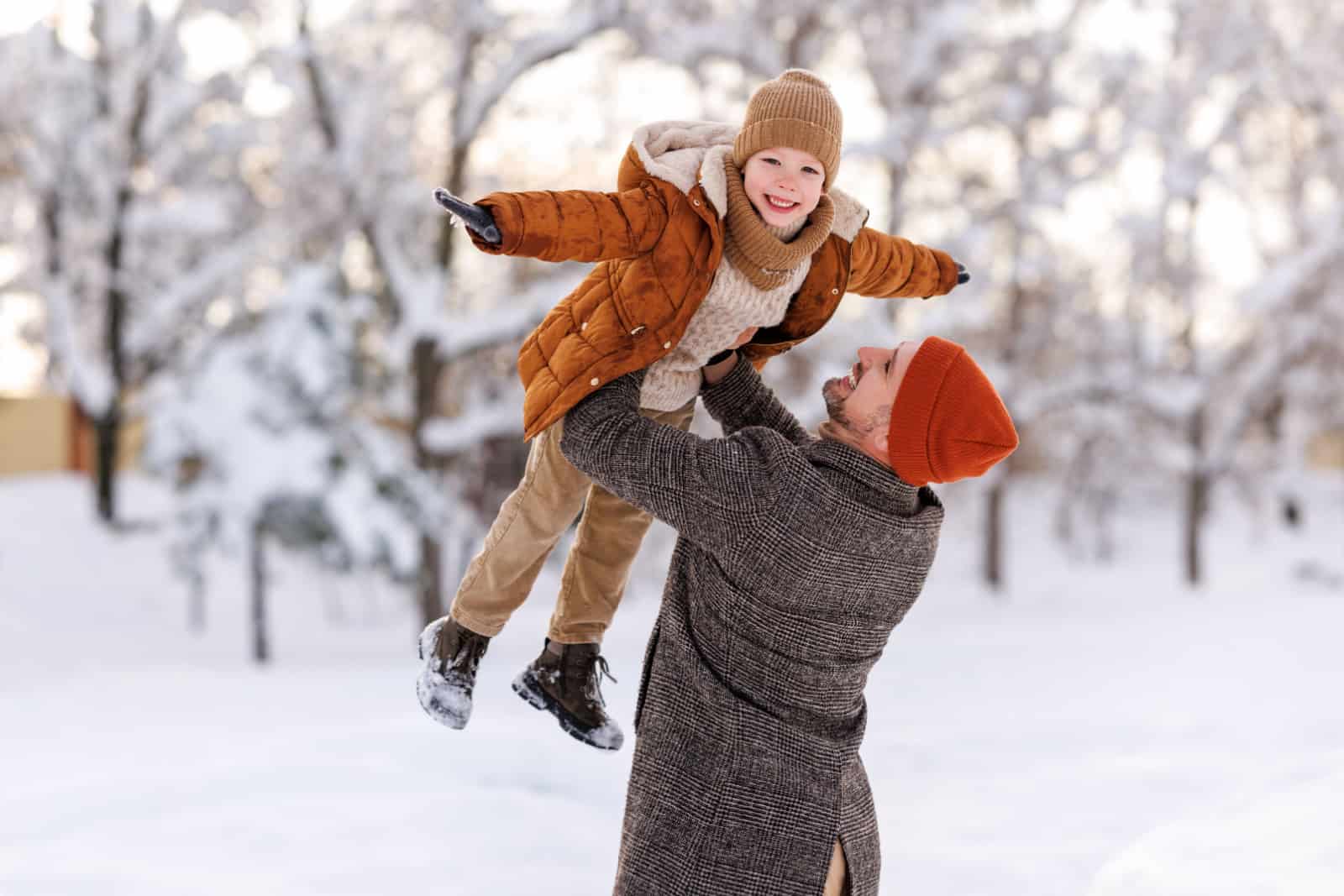 dad holding son