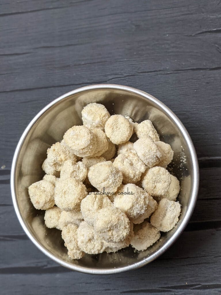 frozen popcorn chicken in a steel bowl