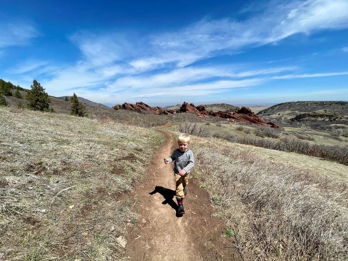 boy running on trail