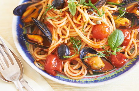 Spaghetti with mussels, capers, olives and  cherry tomatoes recipe