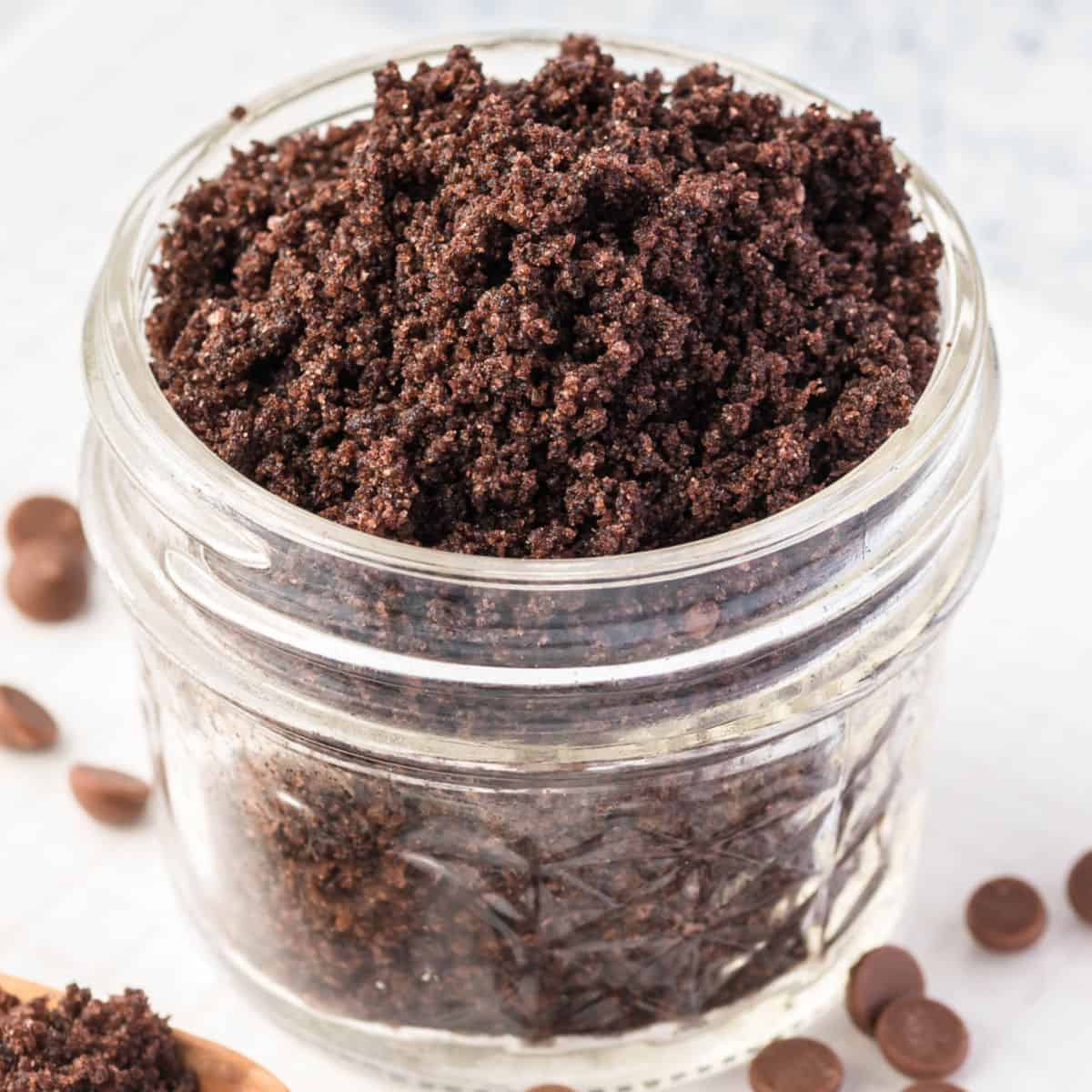 square image of chocolate lip scrub in a small jar