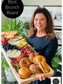 woman holding a large rectangular brunch board