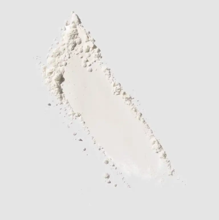 a swatch of white powder on a white surface