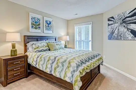 bedroom featuring carpet and natural light