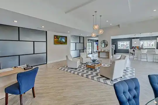 hardwood floored living room featuring natural light