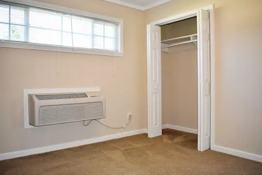 bedroom featuring carpet and natural light