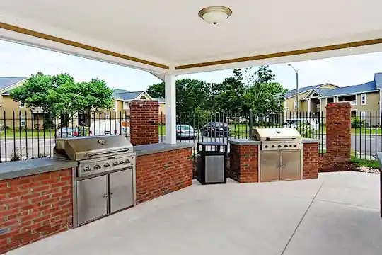 view of terrace featuring an outdoor kitchen