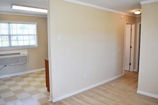 empty room with tile flooring and natural light