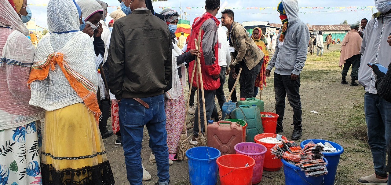 Distribution of Water, Sanitation, and Hygiene (WASH) supplies at a holy water pilgrimage site in Amhara, Ethiopia. Image credit: Hanna Mekonnen, Ethiopian Public Health Institute.