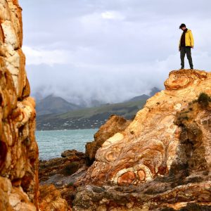 Driving to Christchurch to tramp (hike) the Onawe Track along the Onawe Peninsula between Barrys Bay and Duvauchelle Bay on New Zealand's South Island.