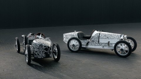 Two examples of the Bugatti Baby II, built by Hedley Studios, featuring the art of Alex Alpert.