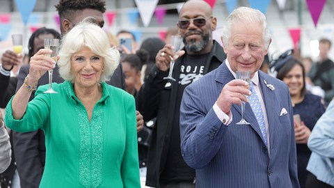 King Charles and Queen Camilla drink Champagne.