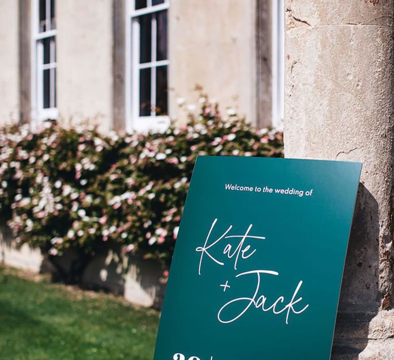 Dark green and white wedding welcome signage for classic country house wedding 