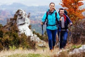 Happy couple hiking Rocky Top Mountain