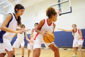 girls playing basketball in a youth sports tournament in Gatlinburg