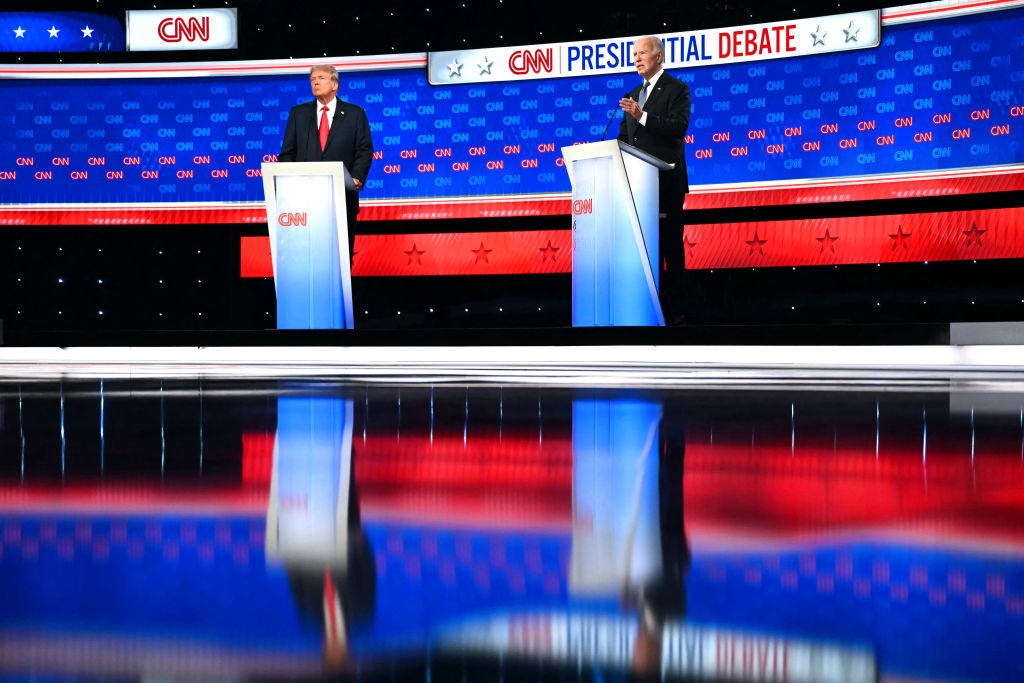 Former President Donald Trump and President Joe Biden on stage for their first debate of the 2024 election in Atlanta on Thursday.