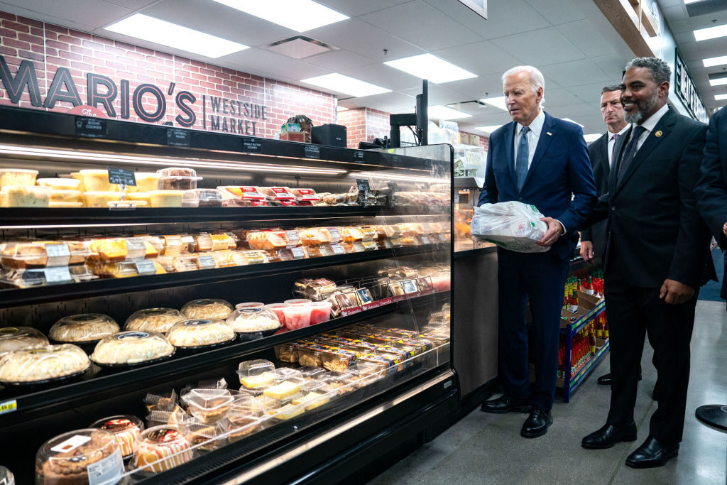 President Joe Biden visits Mario's Westside Market grocery store alongside Rep. Steven Horsford, D-Nev.,  in Las Vegas on Tuesday.