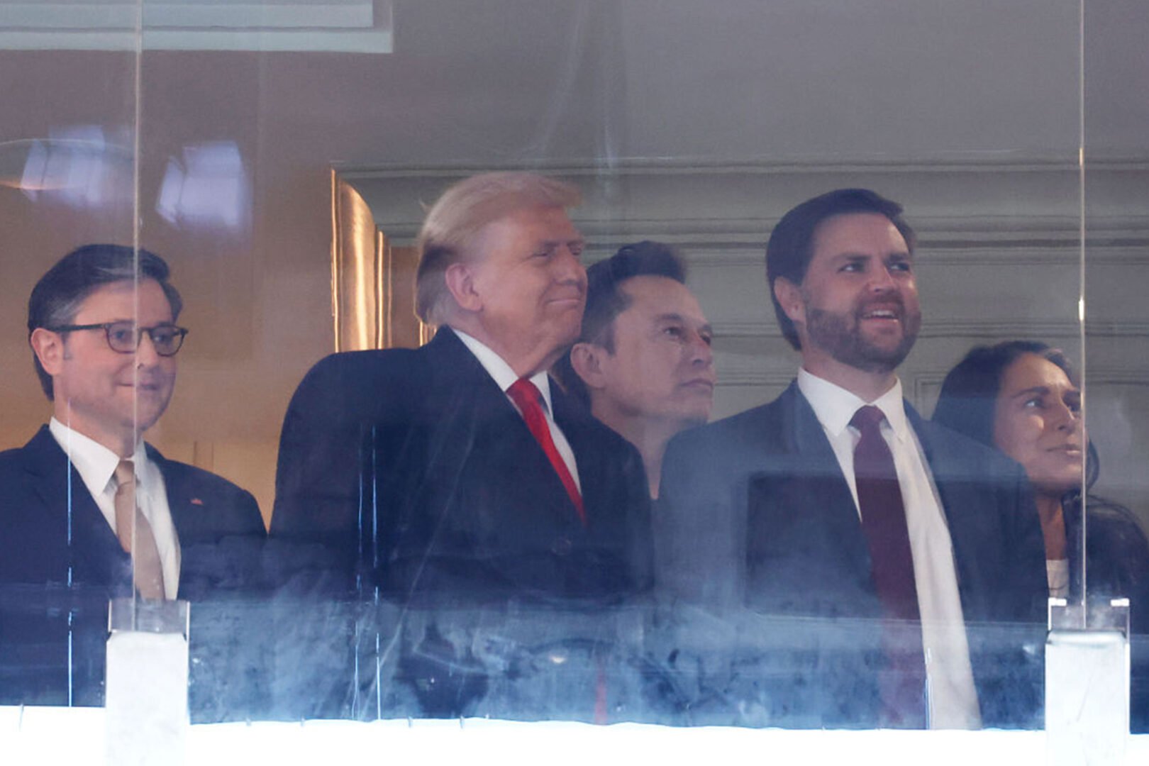 From left, Speaker Mike Johnson, President-elect Donald Trump, Tesla CEO Elon Musk, Vice President-elect JD Vance and former Hawaii Rep. Tulsi Gabbard are seen at the Army-Navy football game in Landover, Md., on Dec. 14.