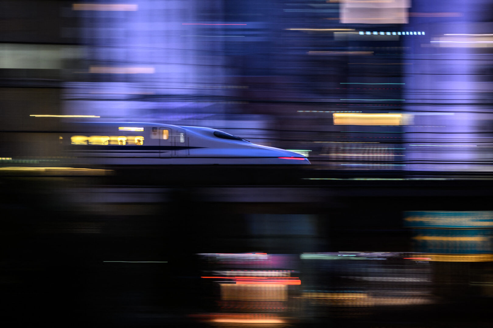 A Tokaido Shinkansen high-speed bullet train passes through the Shiodome district of Tokyo on January 21, 2024.