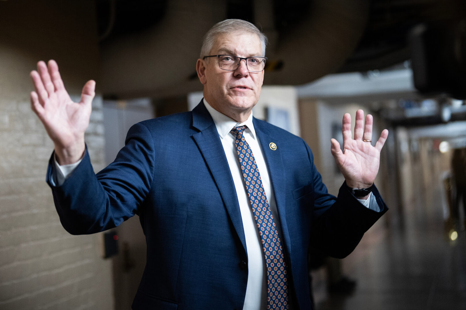 Rep. Barry Loudermilk, R-Ga., led a reinvestigation of the Capitol attack as chair of the House Administration Oversight Subcommittee. Above, he talks to reporters at the Capitol on Dec. 10. 