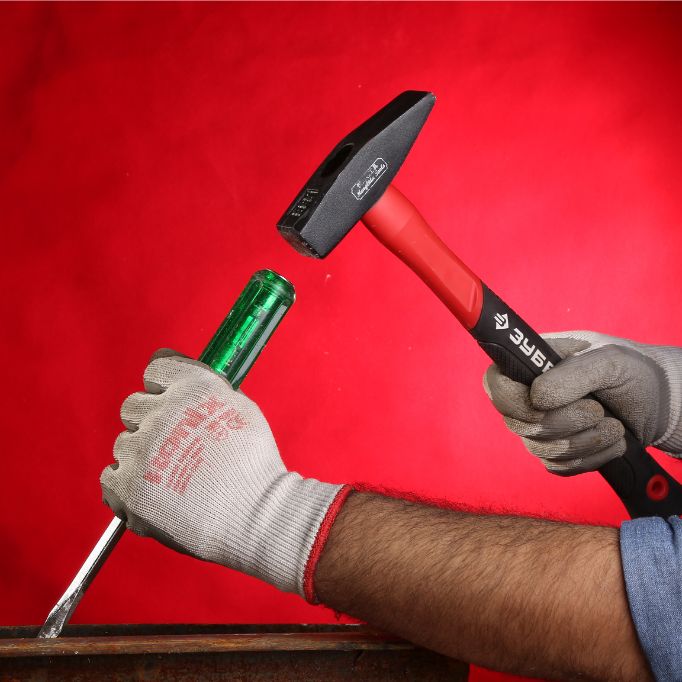 picture of a person using a hammer 