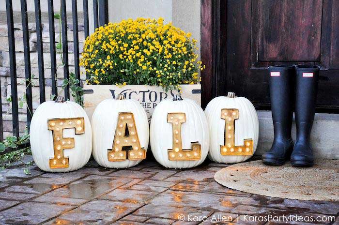 carved letter pumpkins inserted with letter marquee lights