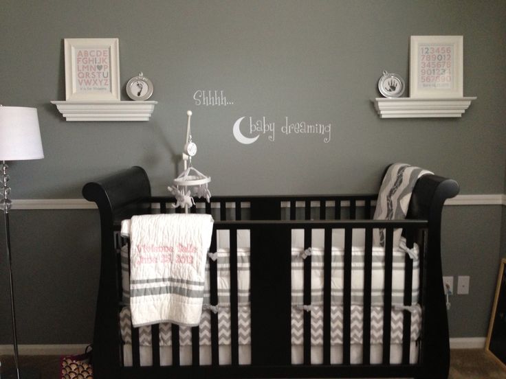  Nursery  Dark gray walls Dark crib White accents Baby  