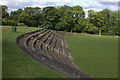 TL0823 : Wardown Park cricket ground terracing by Robert Eva