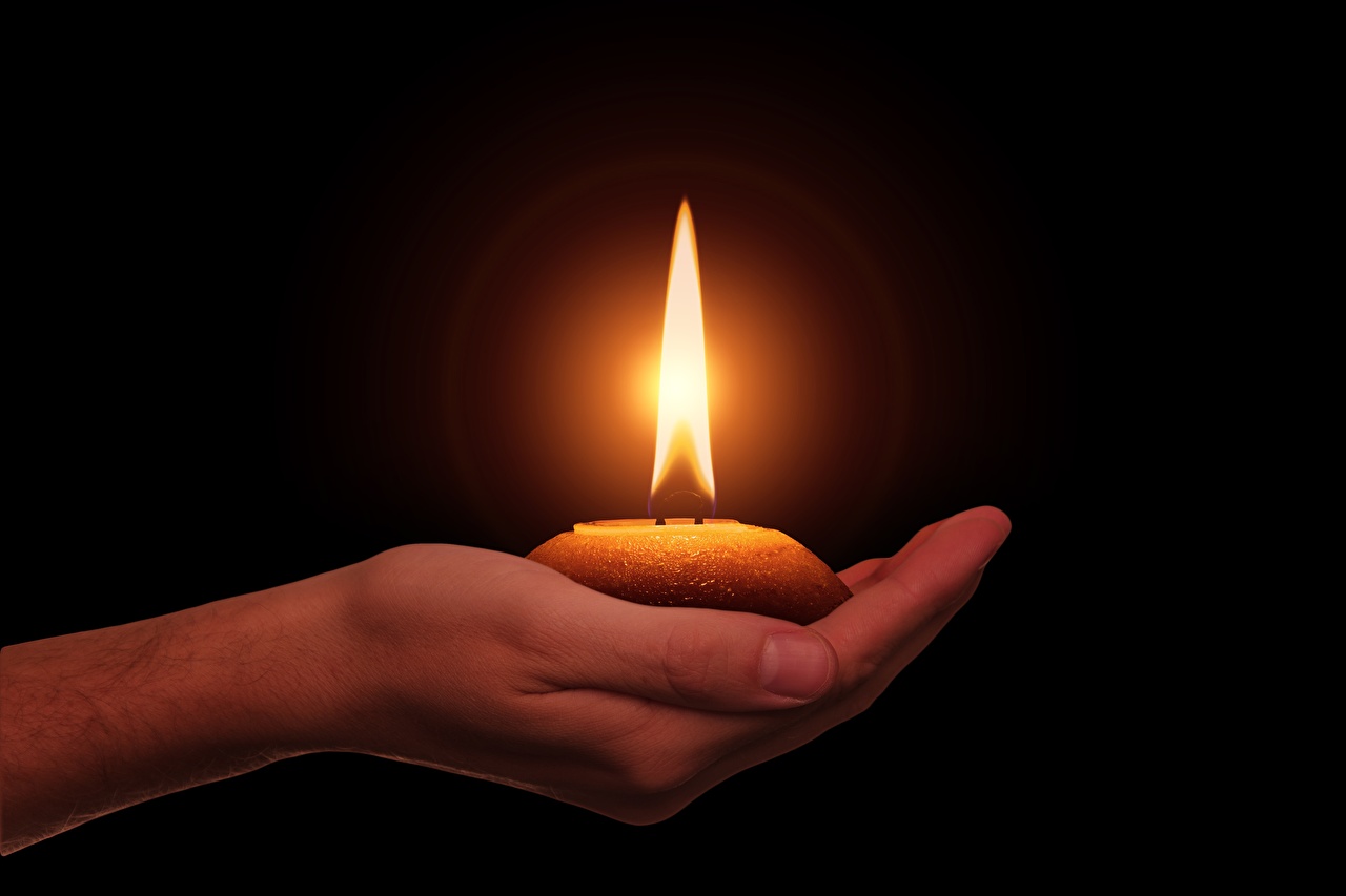 Picture Fire Hands Candles Black background