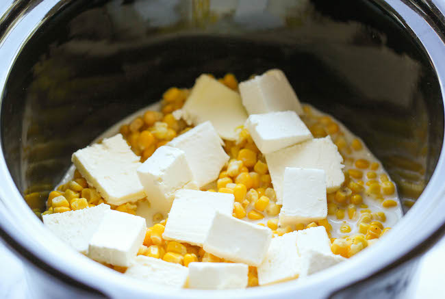 Slow Cooker Creamed Corn - So rich and creamy, and unbelievably easy to make with just 5 ingredients. It does not get easier than that!