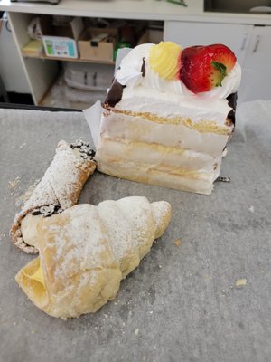 Photo of El Molino Real Bakery - Lawndale, CA, US. Cannoli, cream horn and vanilla pudding cake with a drizzle of chocolate (very moist and delicious if you get it fresh)