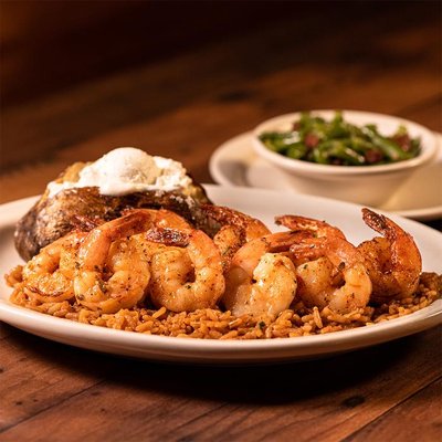 Photo of Texas Roadhouse - Buford, GA, US. a plate of shrimp and rice