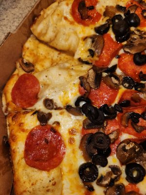 Photo of Round Table Pizza - Reno, NV, US. pepperoni, mushrooms, and black olives