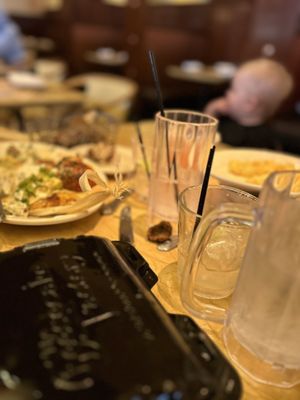 Photo of The Cheesecake Factory - Pleasanton, CA, US. My sweet Corn Tamale Cakes to go! Also had a regular Margarita (2) and water. My friend had the same plus Macaroni Balls!