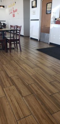 Photo of Round Table Pizza - Reno, NV, US. wood flooring in a restaurant