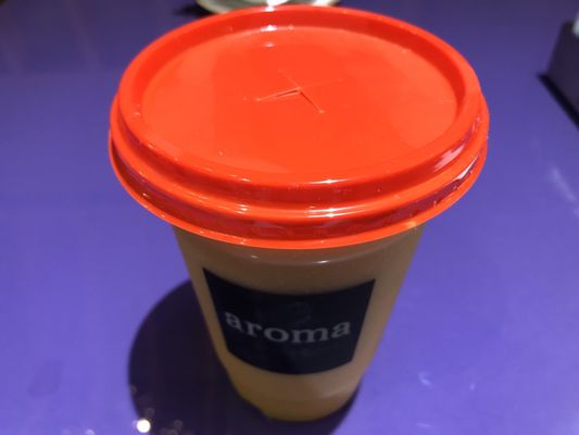 Photo of Aroma Espresso Bar - Toronto, ON, CA. a cup of coffee