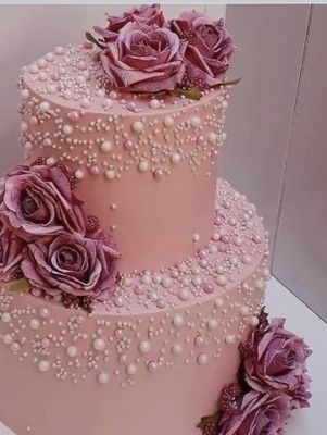 Photo of El Molino Real Bakery - Lawndale, CA, US. a pink wedding cake