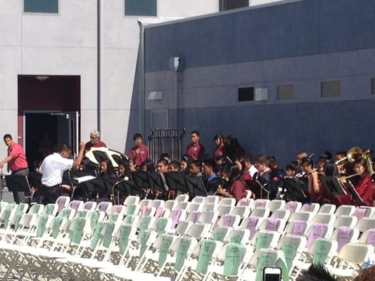 Photo of Columbia Middle School - Sunnyvale, CA, US. Mr. Charles Ancheta conducts the Columbia Middle School band for the promotion...