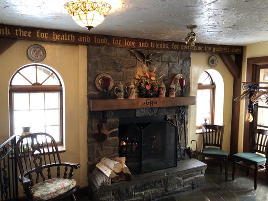 Photo of Gladchuk Bros Restaurant - Frederick, MD, US. a stone fireplace and chairs