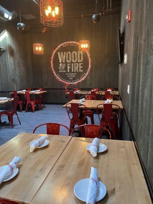 Photo of Wood & Fire Neapolitan Style Pizza - Pleasantville, NY, US. tables and chairs