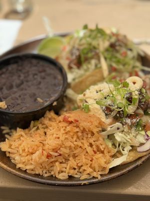 Photo of Belching Beaver Brewery Tavern & Grill - Vista, CA, US. Fish tacos with rice and beans.