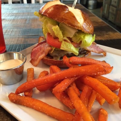 Photo of Rustic Burger House - Santa Clarita, CA, US. Cali burger on a pretzel bun.