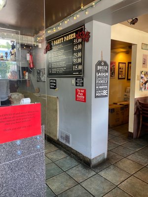 Photo of Memphis BBQ - Woodbridge, ON, CA. menus on the wall of the restaurant