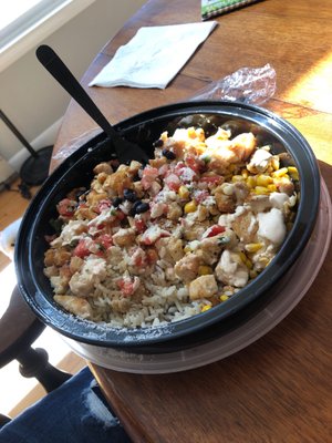 Photo of Taco Loco - Washington, DC, DC, US. a bowl of mexican rice with chicken and corn