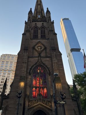 Photo of Trinity Church Wall Street - New York, NY, US. Light thru the stained glass windows in early evening