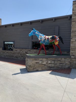 Photo of Pioneer of Texas - Wichita Falls, TX, US. a painted horse in front of a building