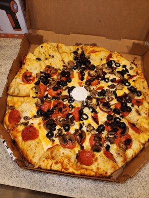 Photo of Round Table Pizza - Reno, NV, US. pepperoni, olives, and cheese