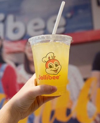 Photo of Jollibee - South San Francisco, CA, US. a hand holding a cup of juice