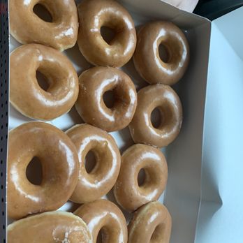 A dozen glazed doughnuts