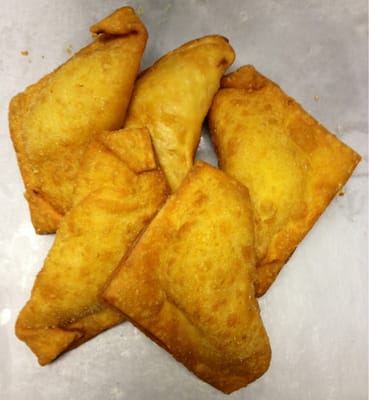 Photo of Love Seafood - Mobile, AL, US. a pile of fried pastries